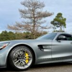 Matte gray 2018 Mercedes-AMG GT R with TW022 split-spoke two-piece wheels, front three-quarter view