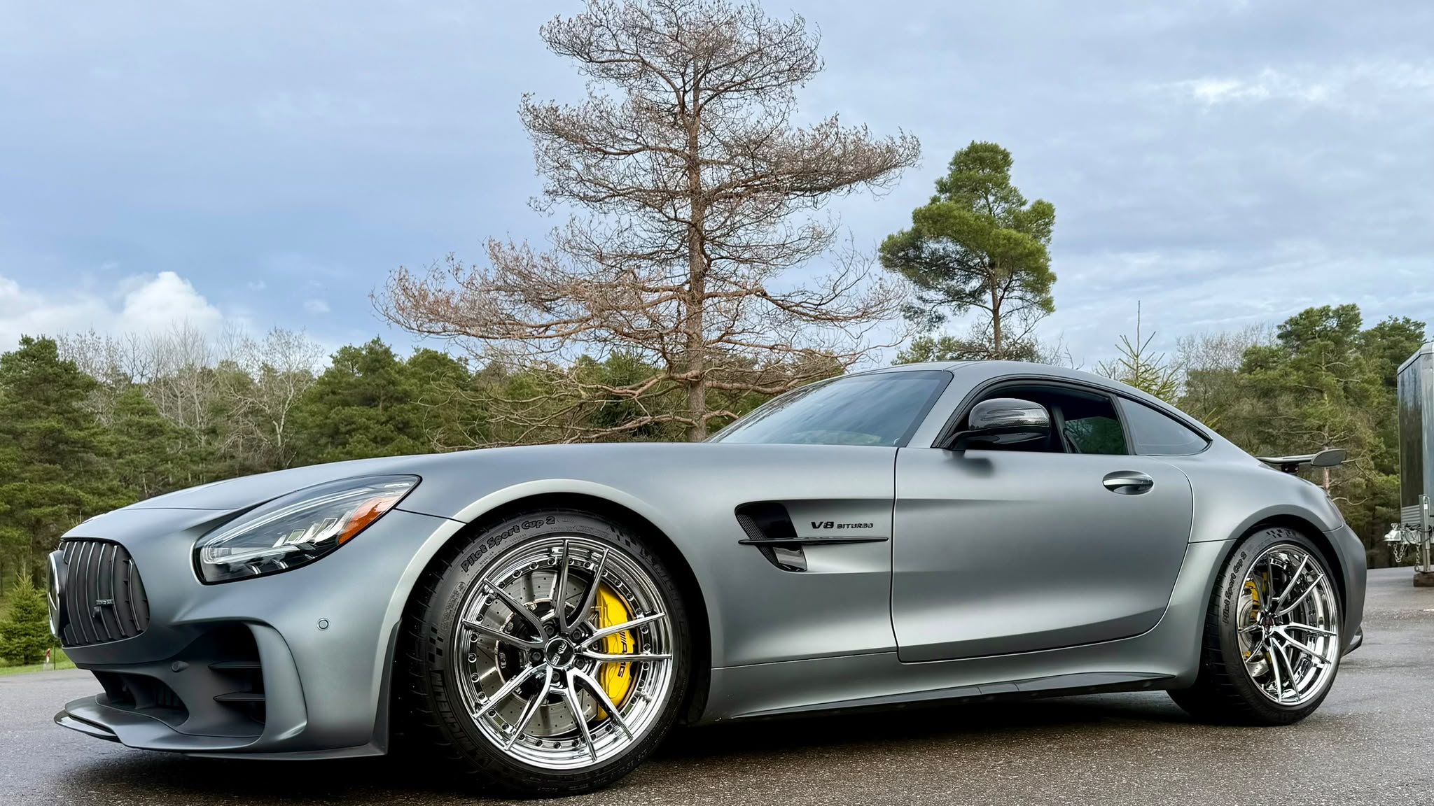 Matte gray 2018 Mercedes-AMG GT R with TW022 split-spoke two-piece wheels, front three-quarter view