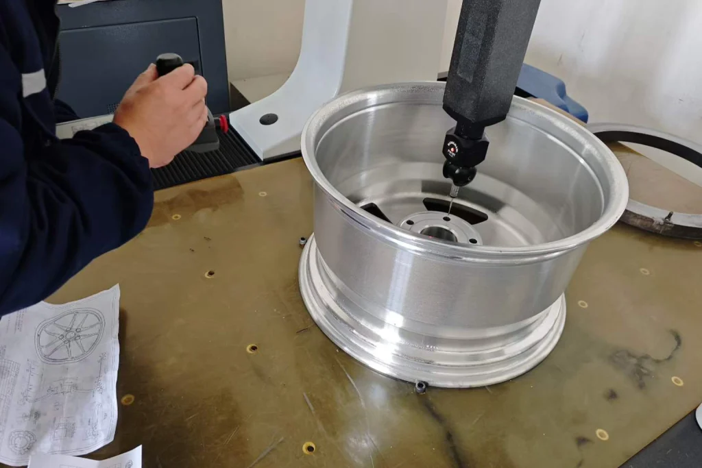 Dimensional inspection of a forged wheel with measuring equipment