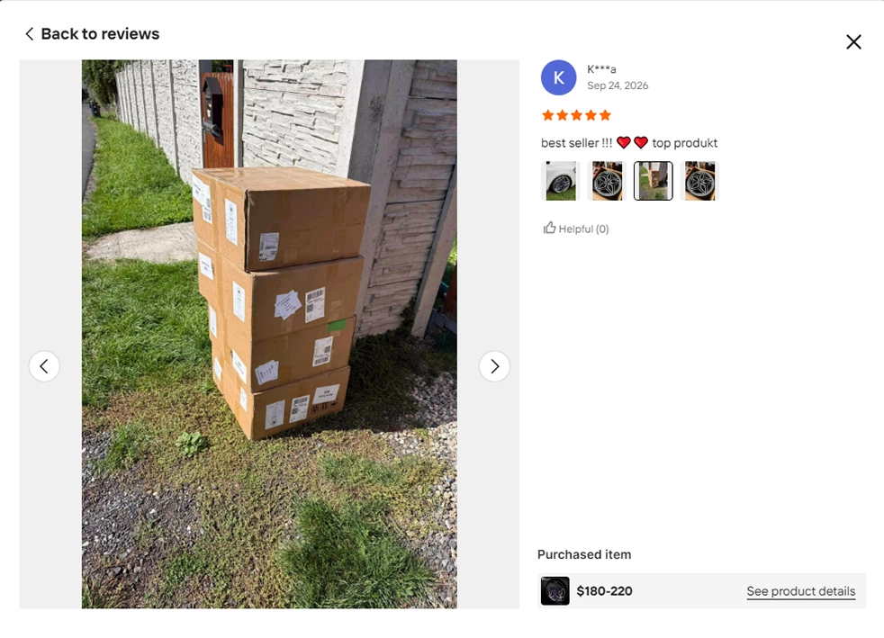 Buyer review screenshot showing stacked delivered wheel cartons