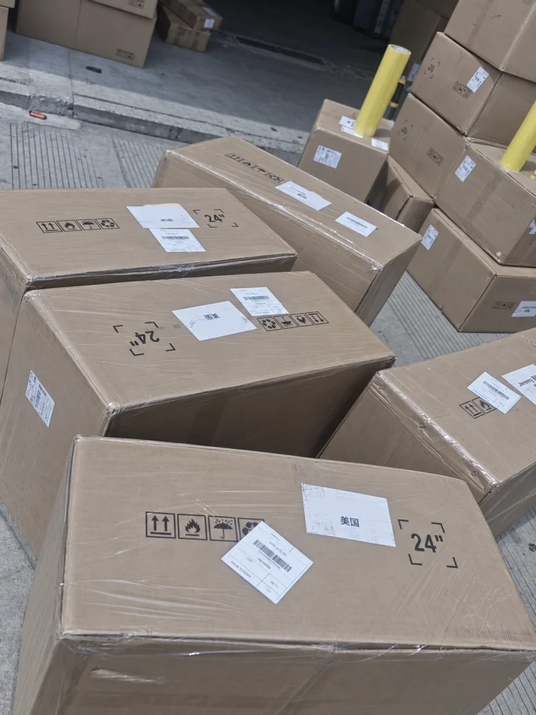 Labeled wheel cartons staged for international forged wheel shipping