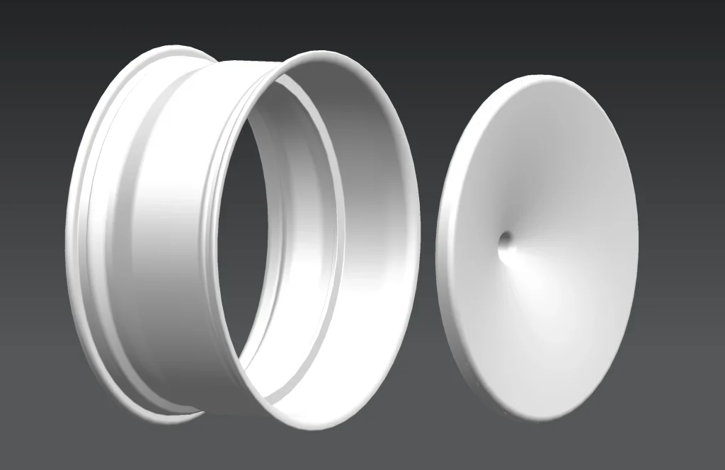 Render illustrating a separate center blank and complete rim for a two-piece wheel.