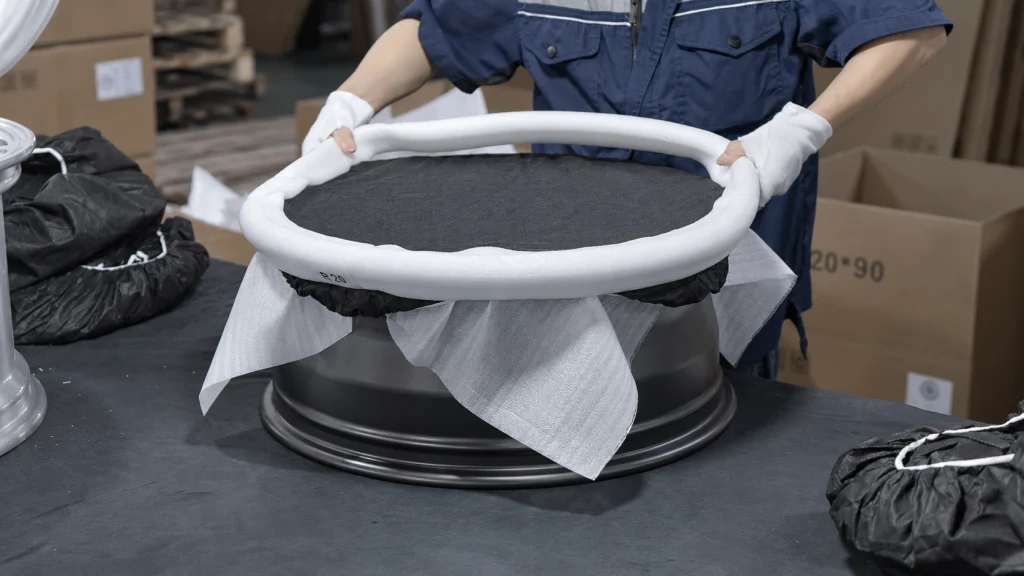 Protective cover and foam ring being fitted around the wheel face and rim